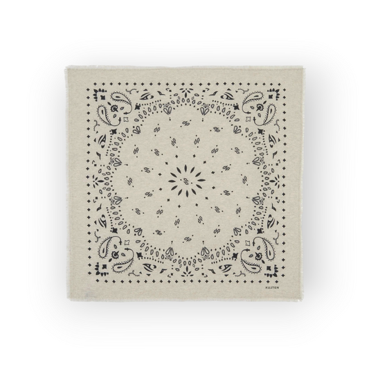 Ygreque Kujten Hachiko square bandana in oatmeal beige cashmere with a black paisley print and frayed edges