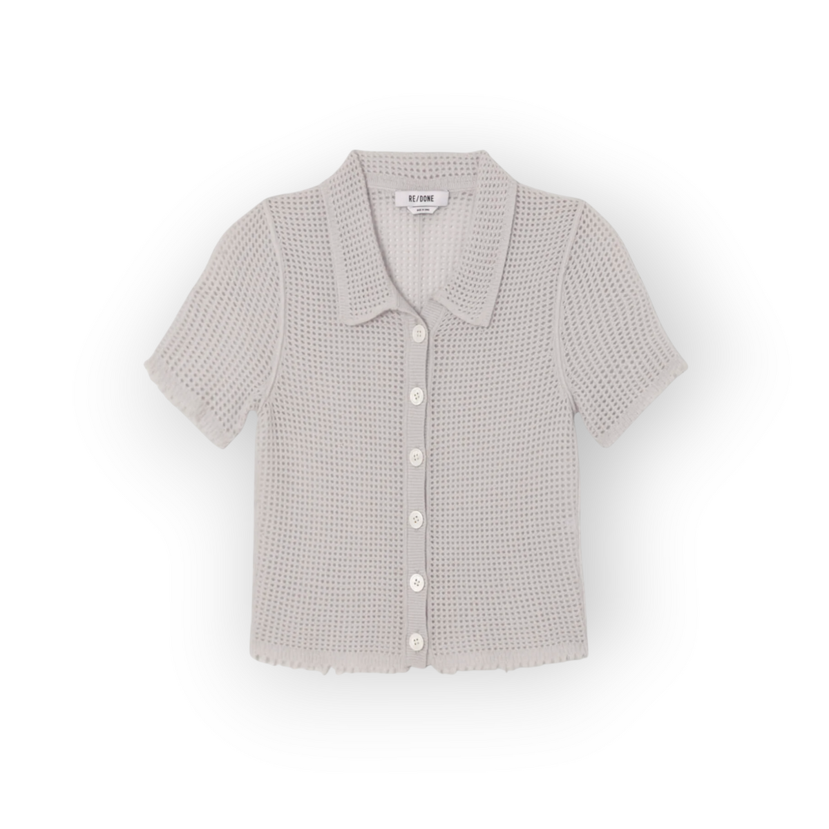Ygreque Re/done Amelia polo in mist grey cashmere with a crochet-style mesh knit, button front, and cropped fit.