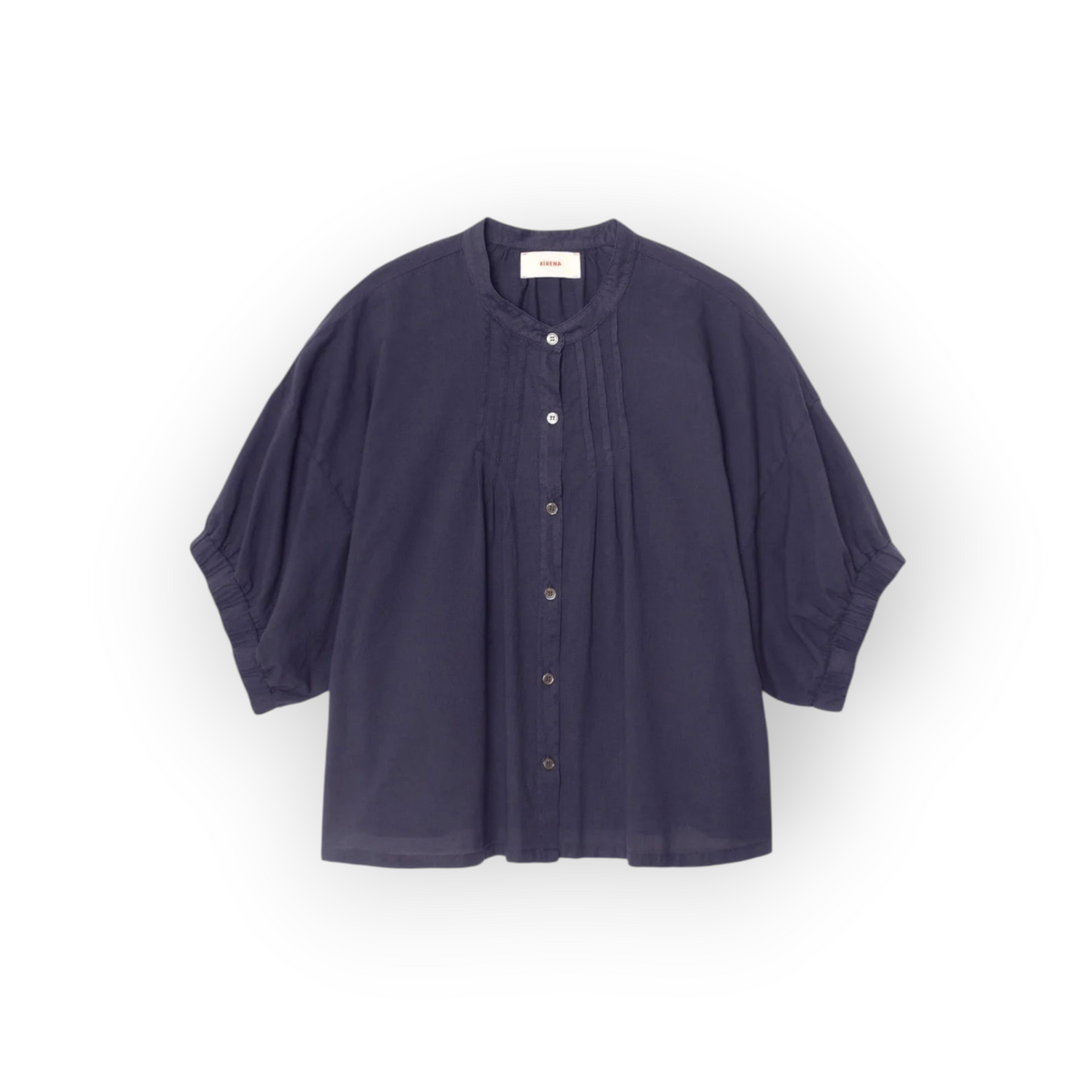 Ygreque Xirena navy blue cotton poplin blouse with a band collar, button front, and elbow-length puff sleeves.