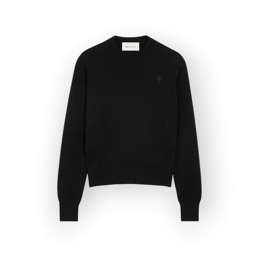 Ygreque Ami Paris black merino wool crew neck sweater with tonal Ami de Coeur embroidery on the chest.