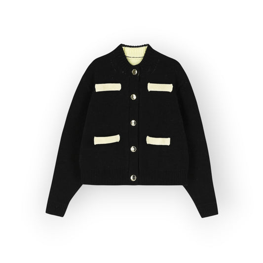 Ygreque B.B. Wallace Goldin cardigan in black and ecru Shetland wool with round neck and four patch pockets