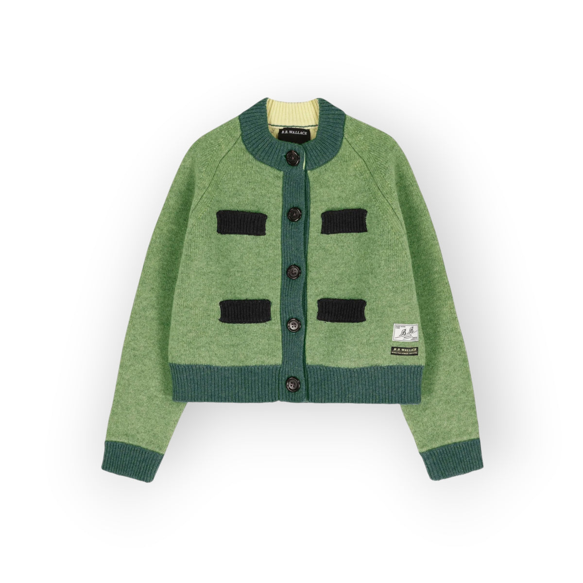 Ygreque B.B. Wallace Frida cardigan in green Shetland wool with round neck, button front, and contrast ribbed trim.