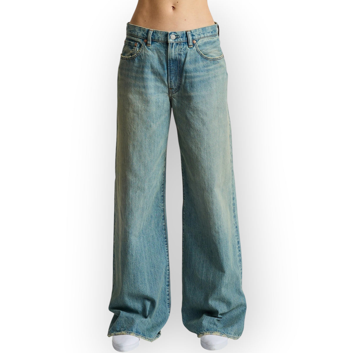 Ygreque Denimist Myla Reed Indigo loose flare jeans in light wash rigid cotton denim worn by a model