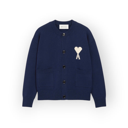 Ygreque navy blue wool and cotton blend cardigan with ecru Ami de Cœur logo on chest and front pockets.